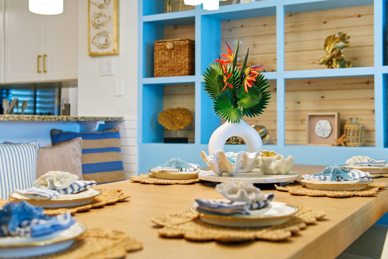 Designer coastal dining experience- enjoy memorable meals at our custom dining space featuring elegant coastal decor, curated place settings and a bright open layout, perfect for gathering, entertaining and relaxing together.