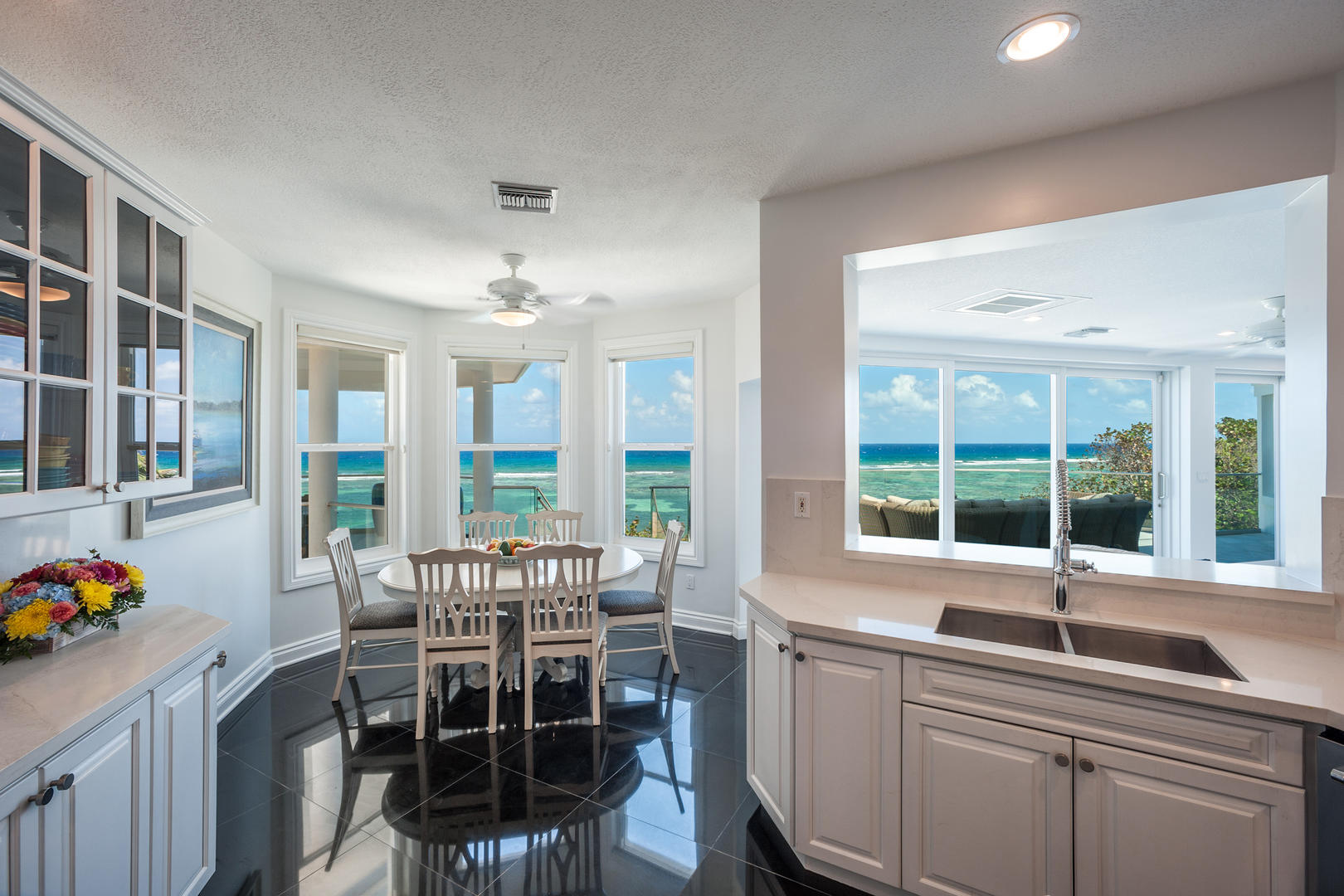 Dining table off the kitchen with seating for 6.