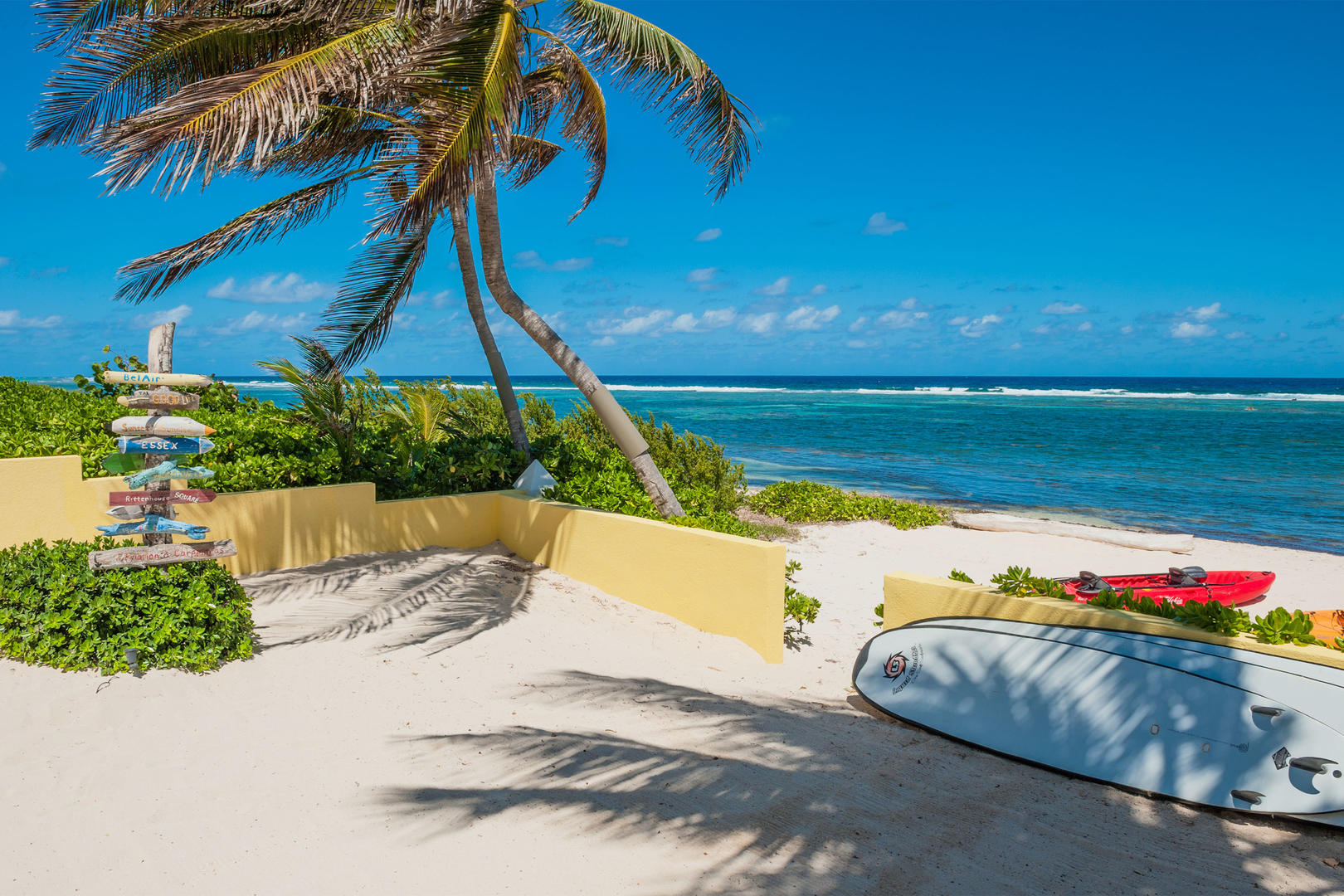 Enjoy a sandy beach steps down from the sun deck.