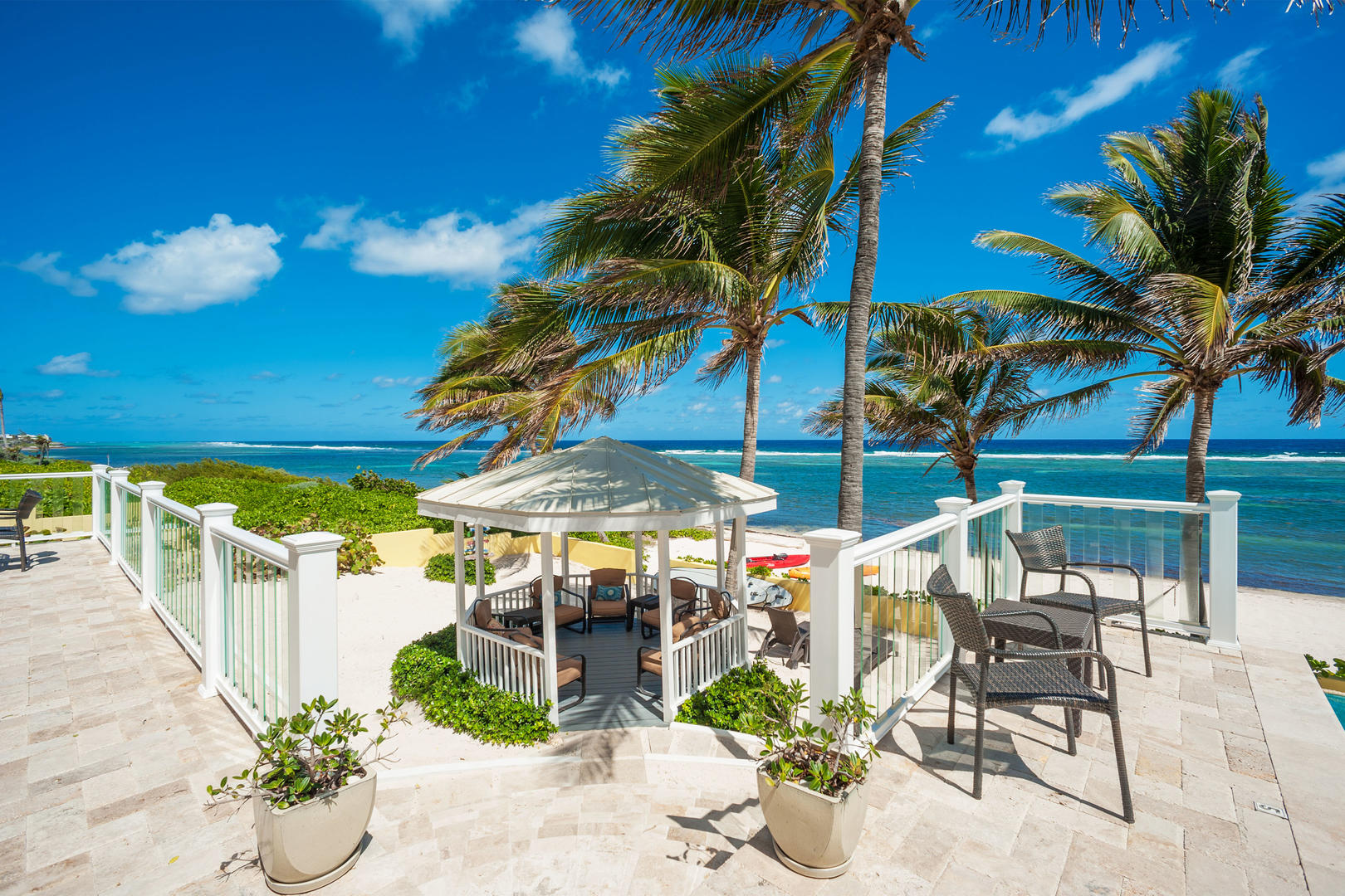 Relax within the gazebo surrounded by beautiful sites and warm Cayman air.