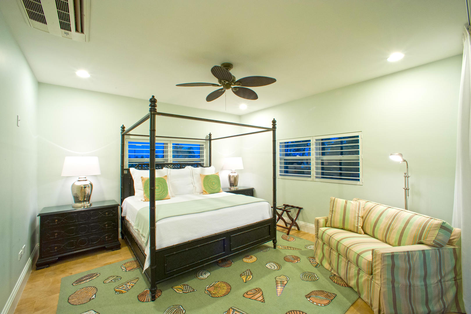 One of four identical King Suites. Each has an ensuite bath and a private screened balcony.