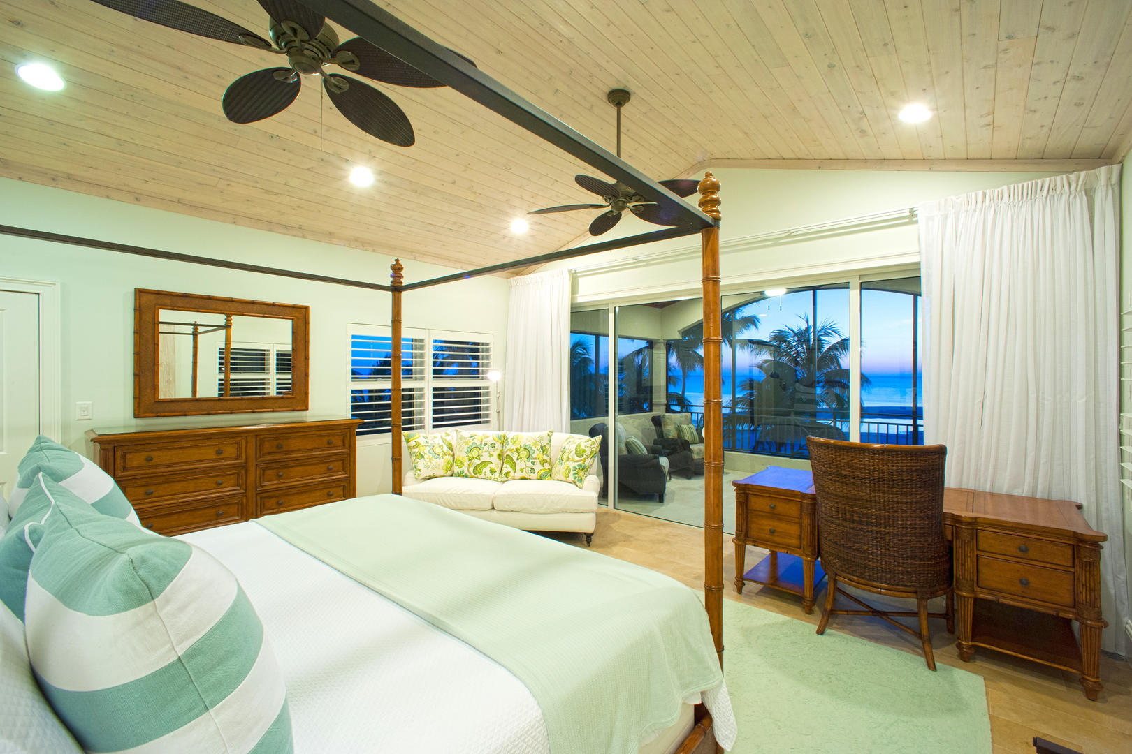 One of four identical King Suites. Each has an ensuite bath and a private screened balcony.