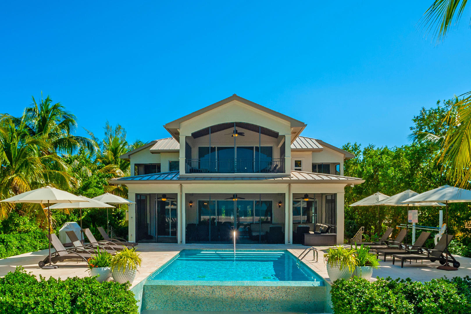 Welcome to one of the most stunning homes in Cayman Kai.
