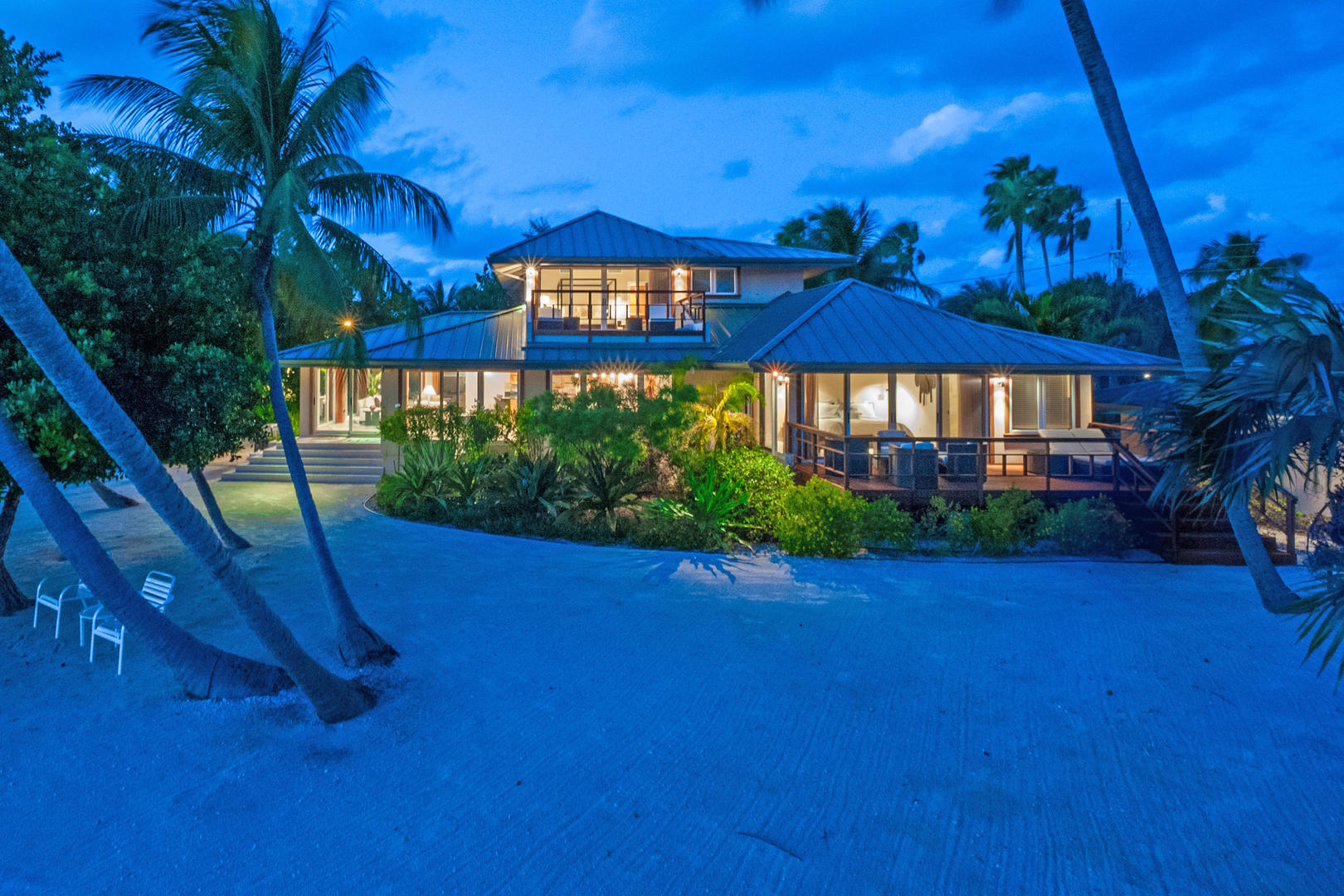 Rear of villa at dusk.