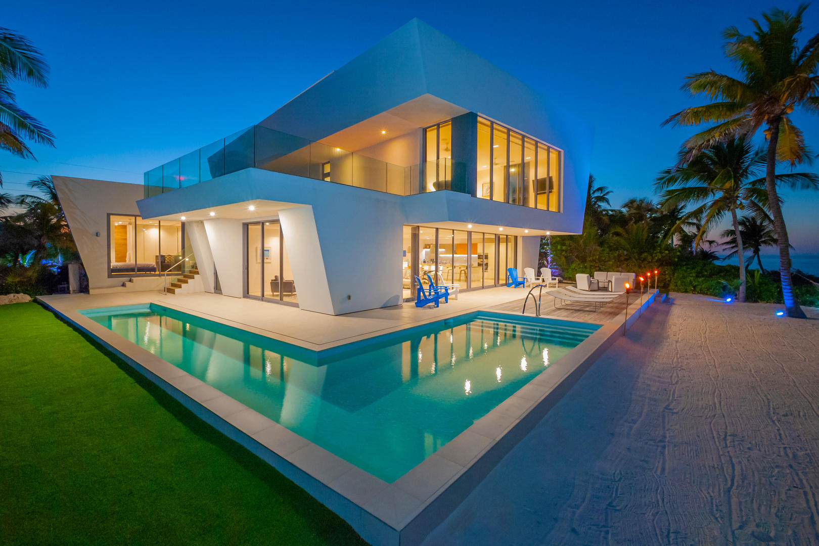 Pool deck lights up at night.