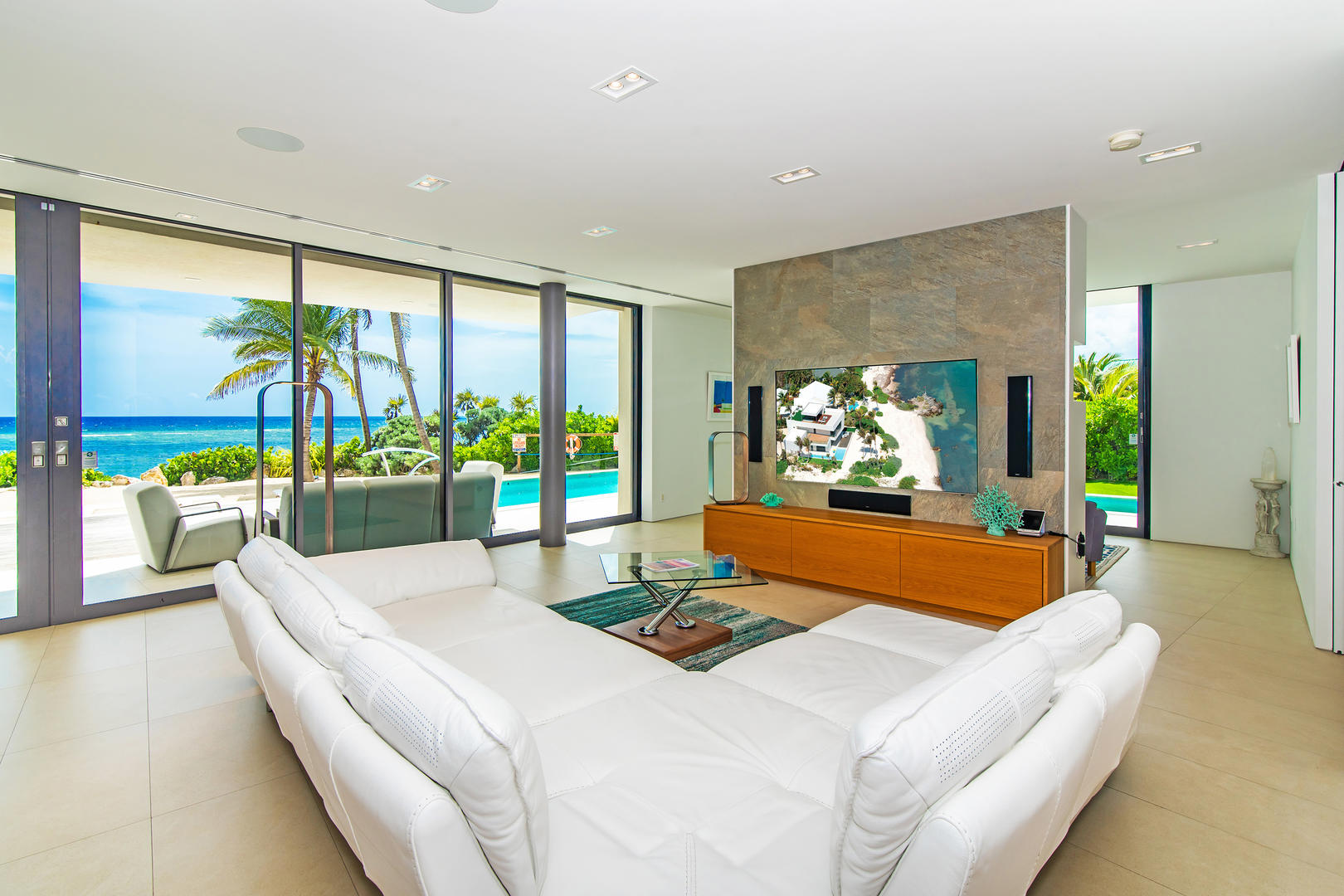 Large sectional sofa and flat screen TV in the living area