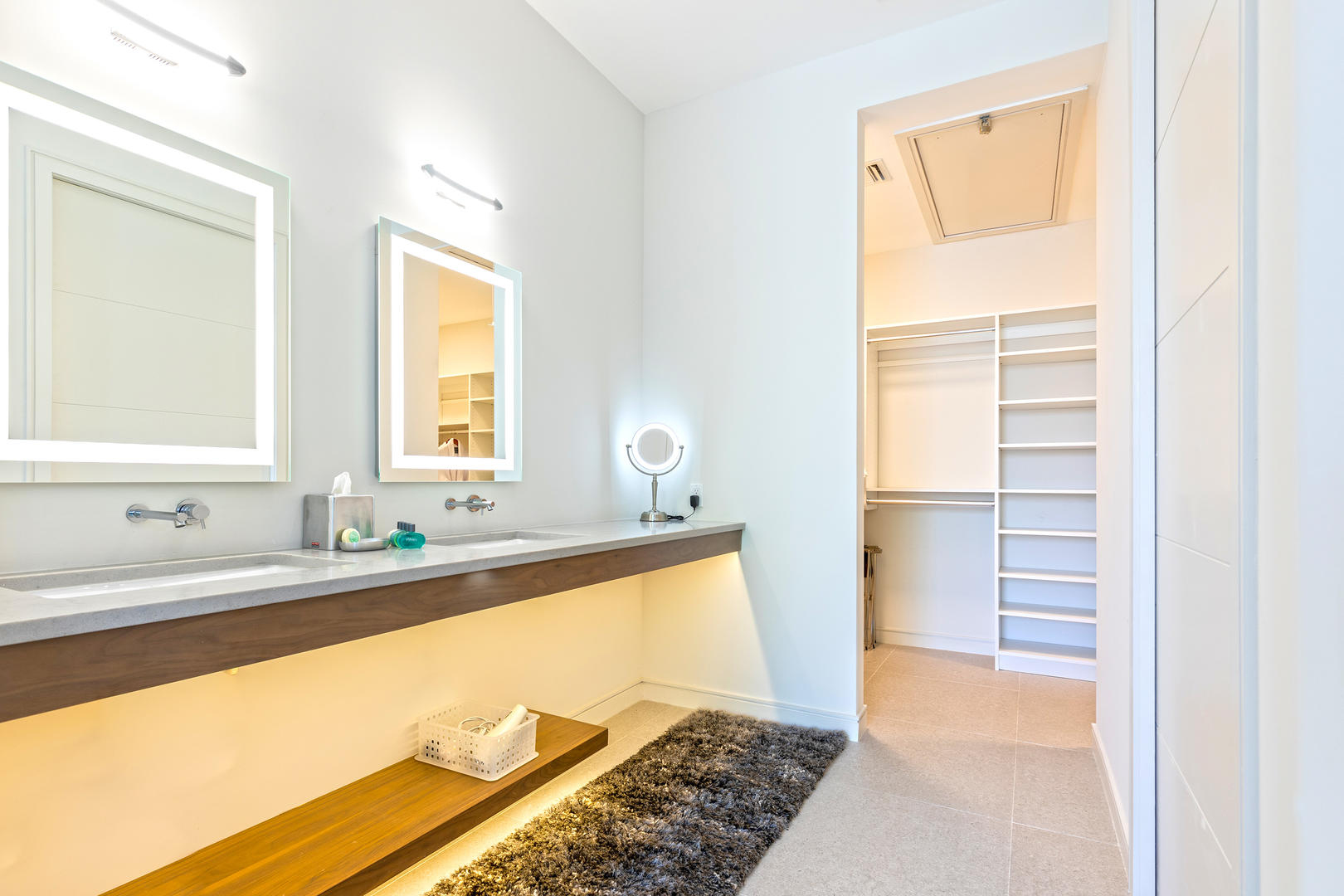 Double vanities and a large walk-in closet sit in the master ensuite bathroom.