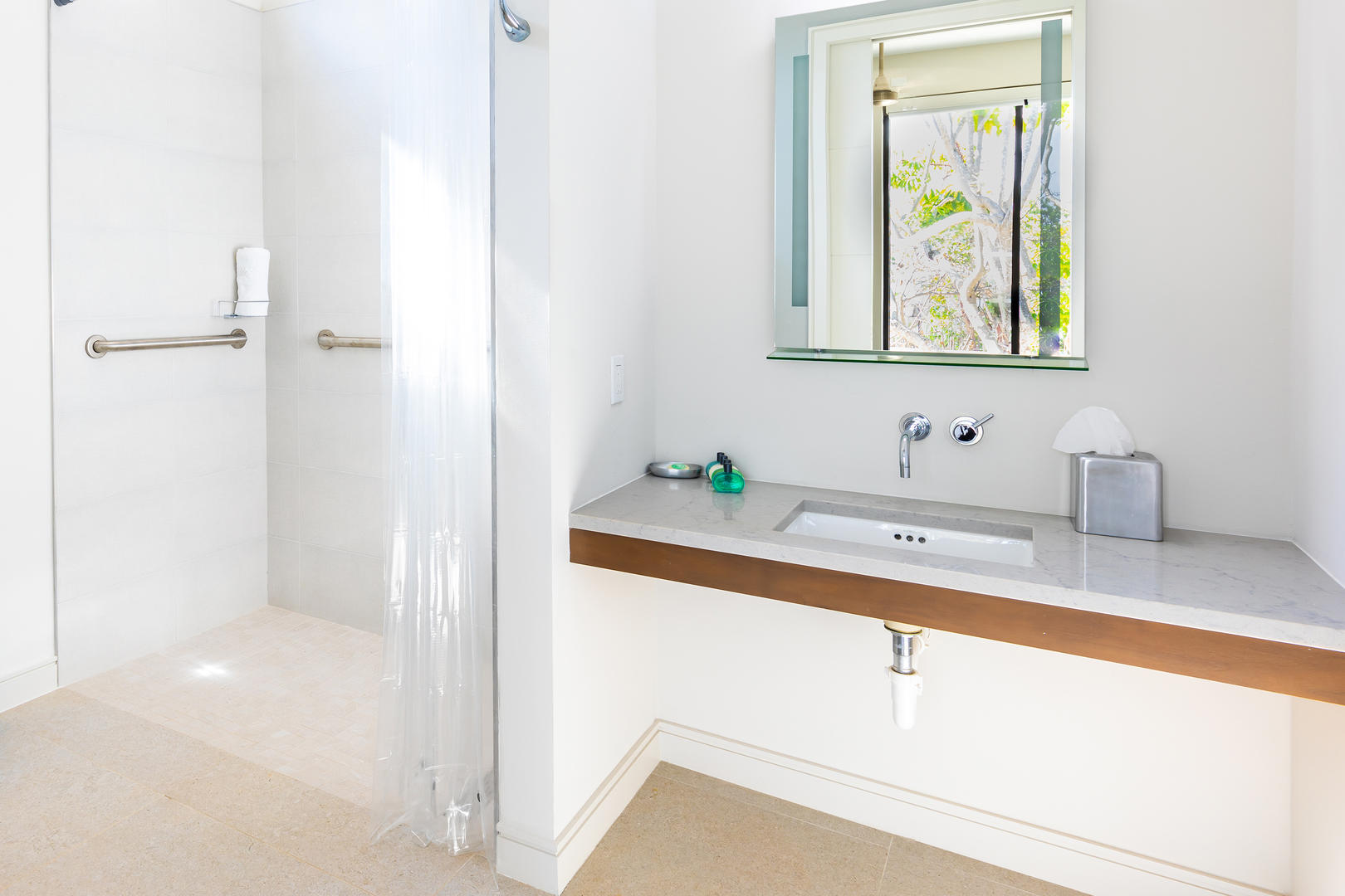 Twin guest suite also has an ensuite bath with shower.
