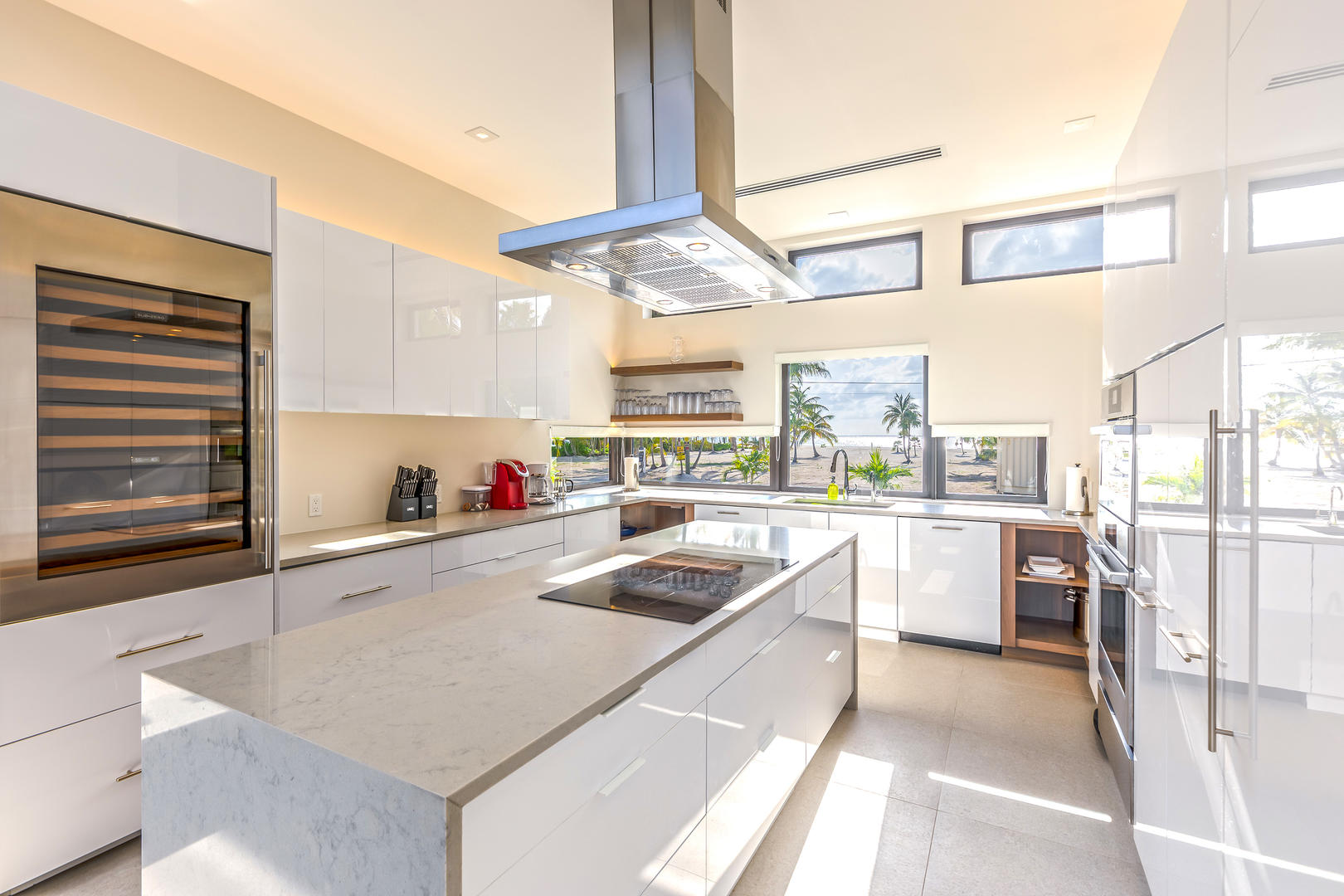 A vacationing chef's dream kitchen with top of the line appliances and views of the beach across the street.