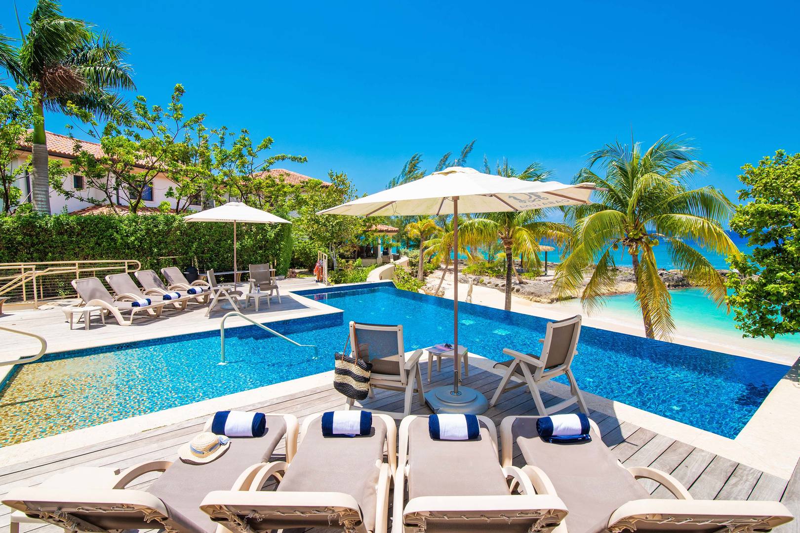 Welcome to Casa Luna! Casa Luna Villa #4 is steps from the resort's beach and pool deck.