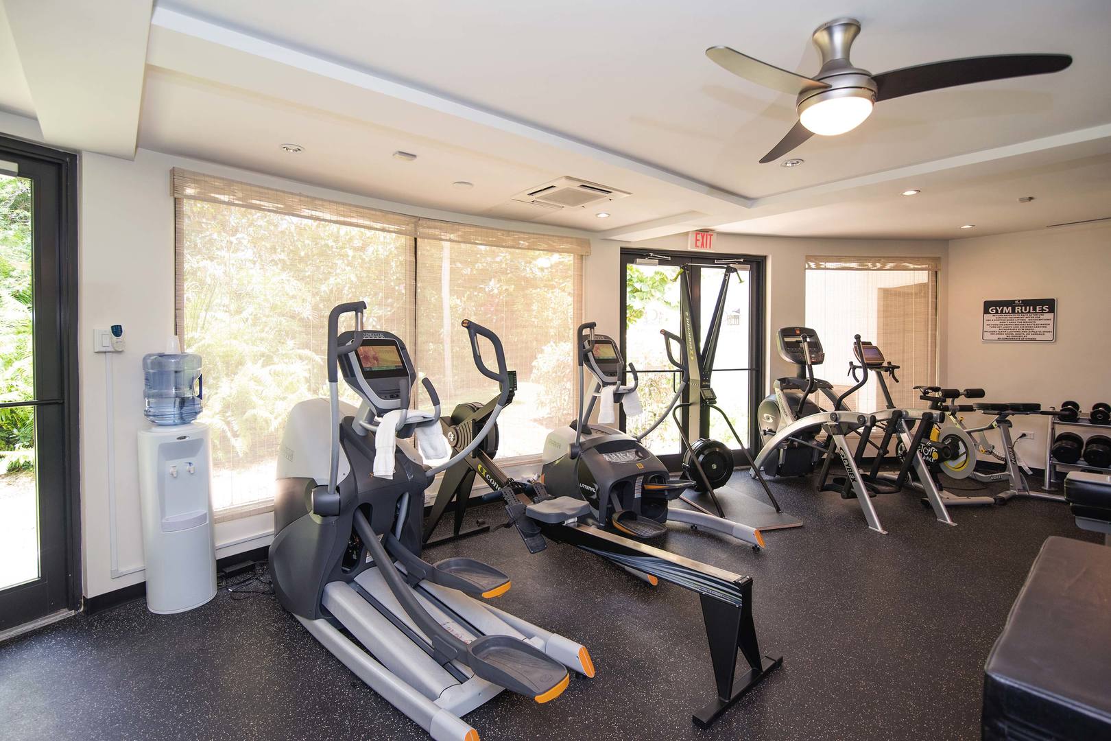 On-site fitness center with weights and cardio equipment.