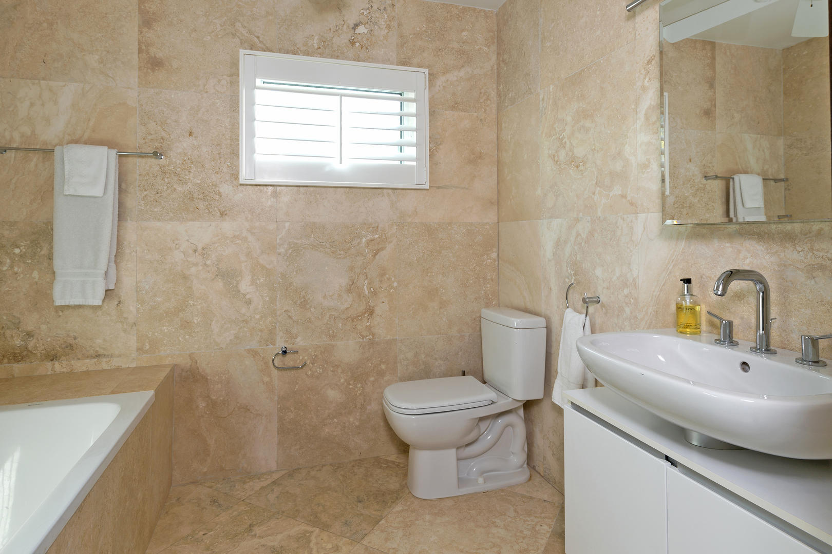 Downstairs East King Bathroom.