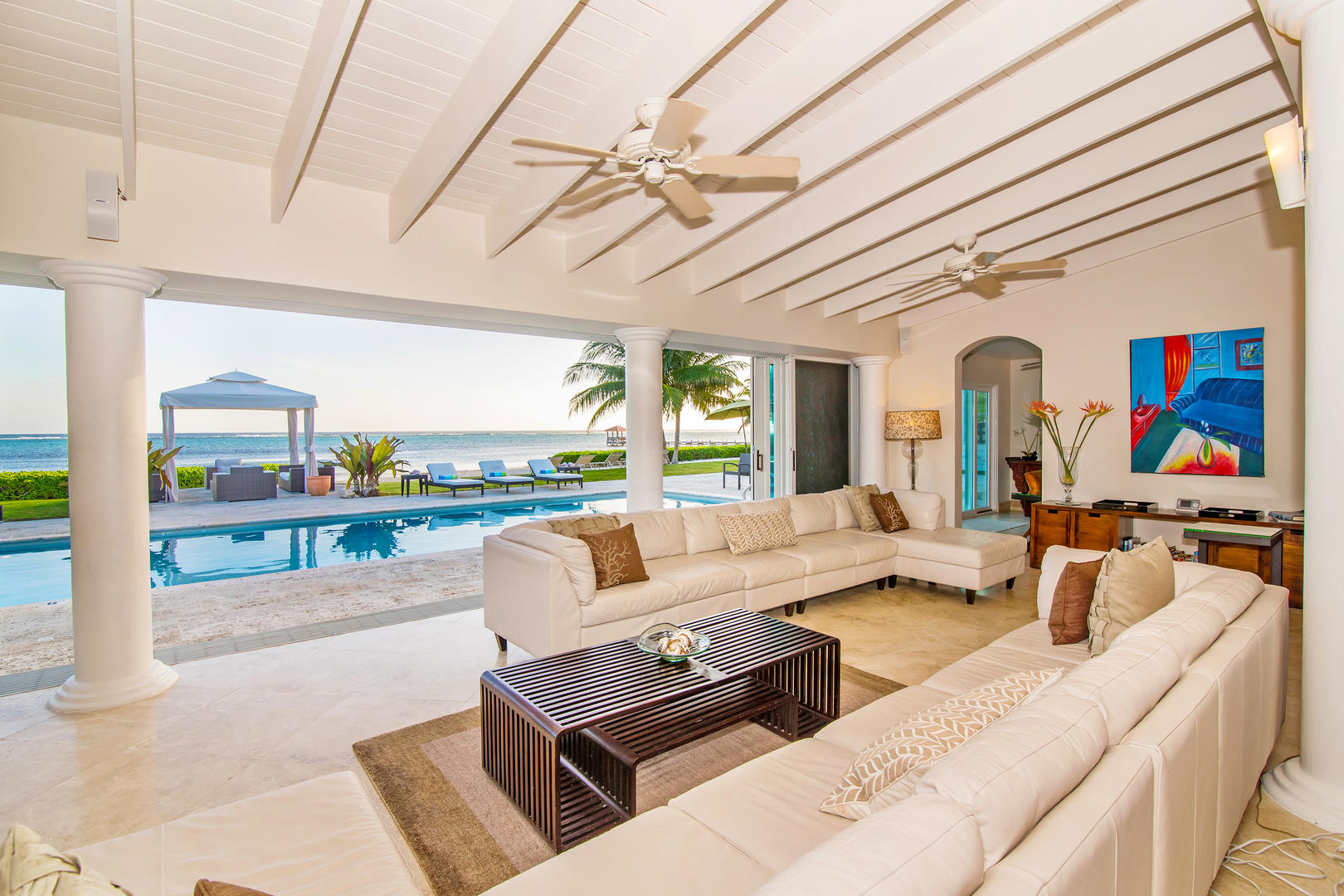 Wide view of the living room showcasing the Caribbean Sea views.