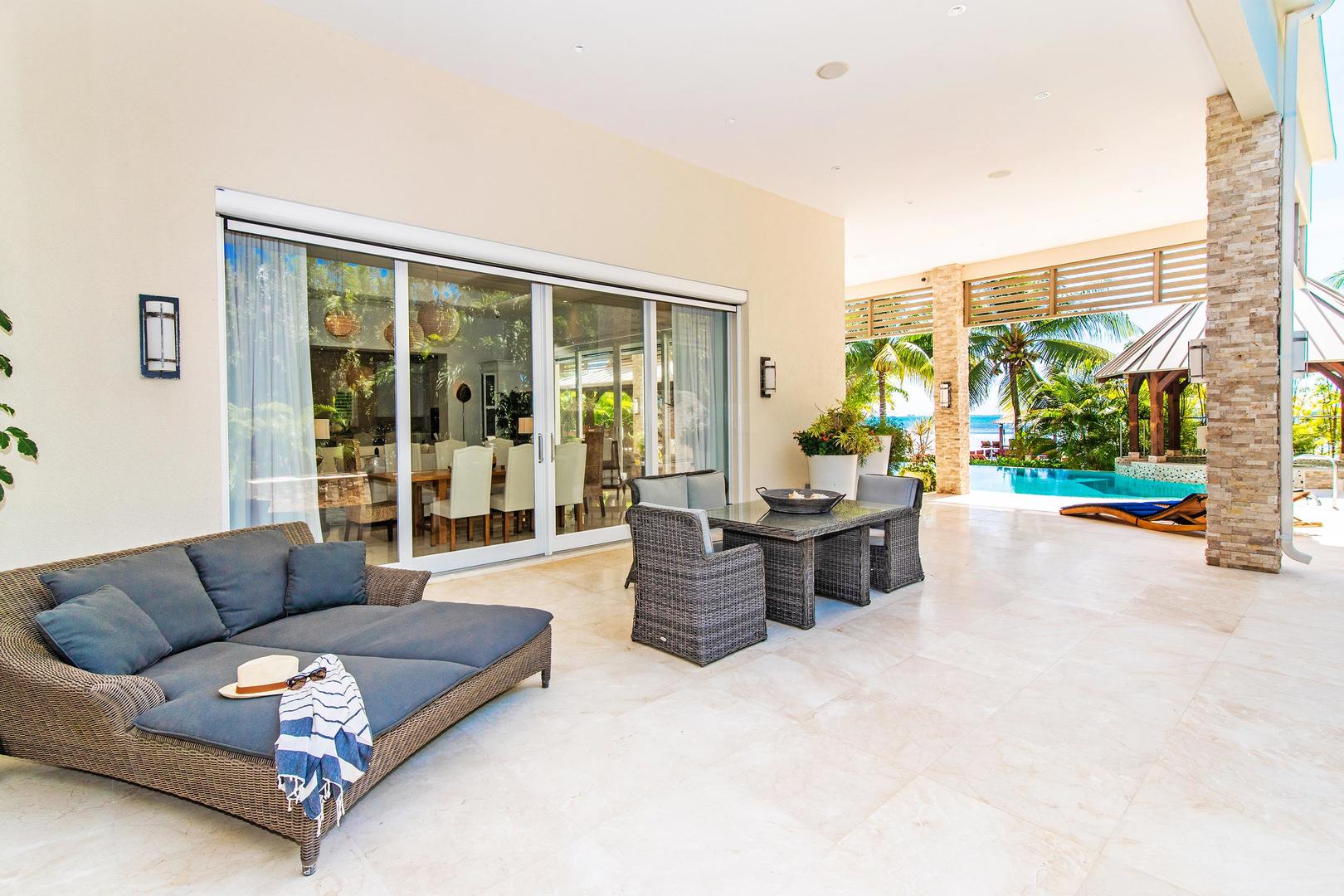 Grab your favorite cocktail and watch the sun go down under the poolside veranda.