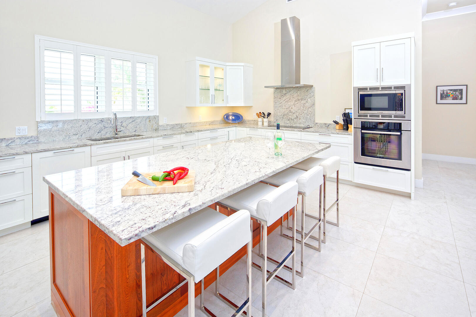 Beautiful modern kitchen with sleek lines and bright whites.