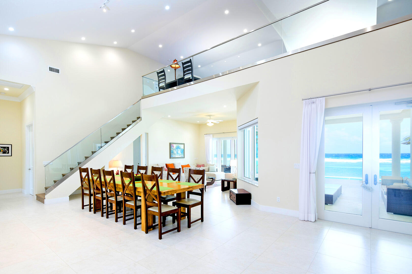 High ceilings add elegant to this open-concept design.