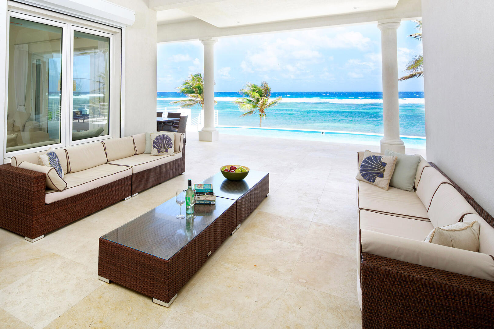 Outdoor lounge area with ocean views.