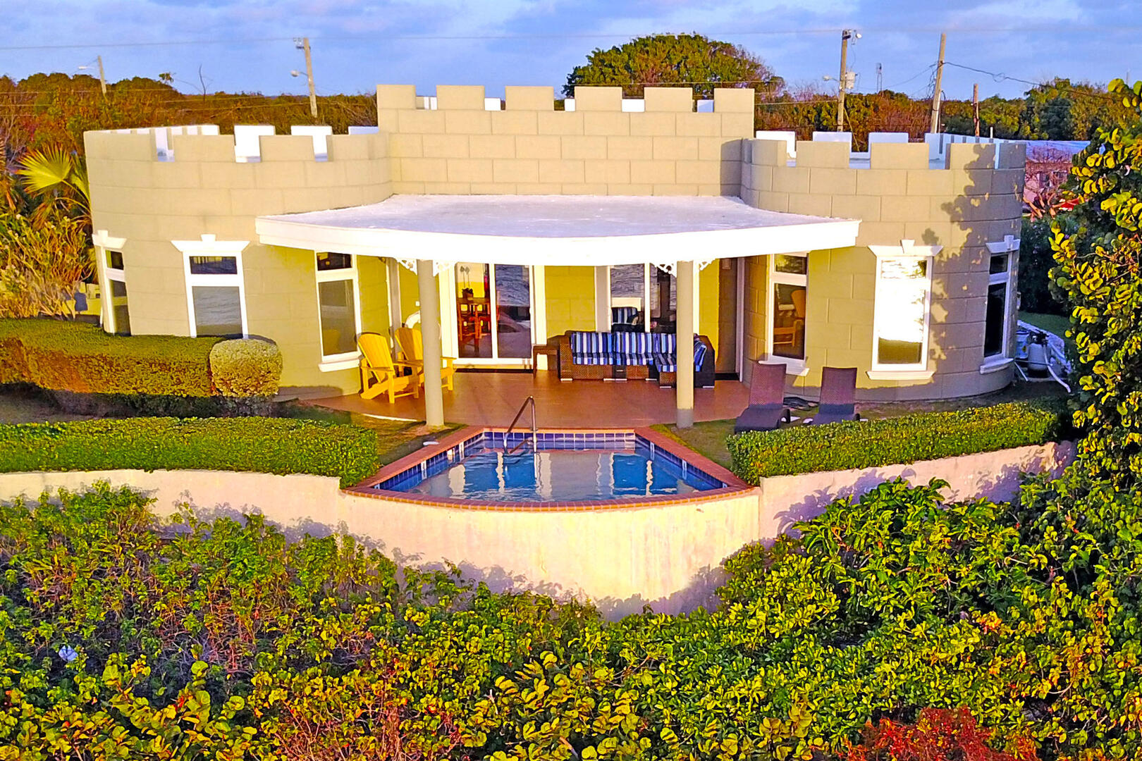 View of the Castle Guesthouse's backyard pool deck. 
