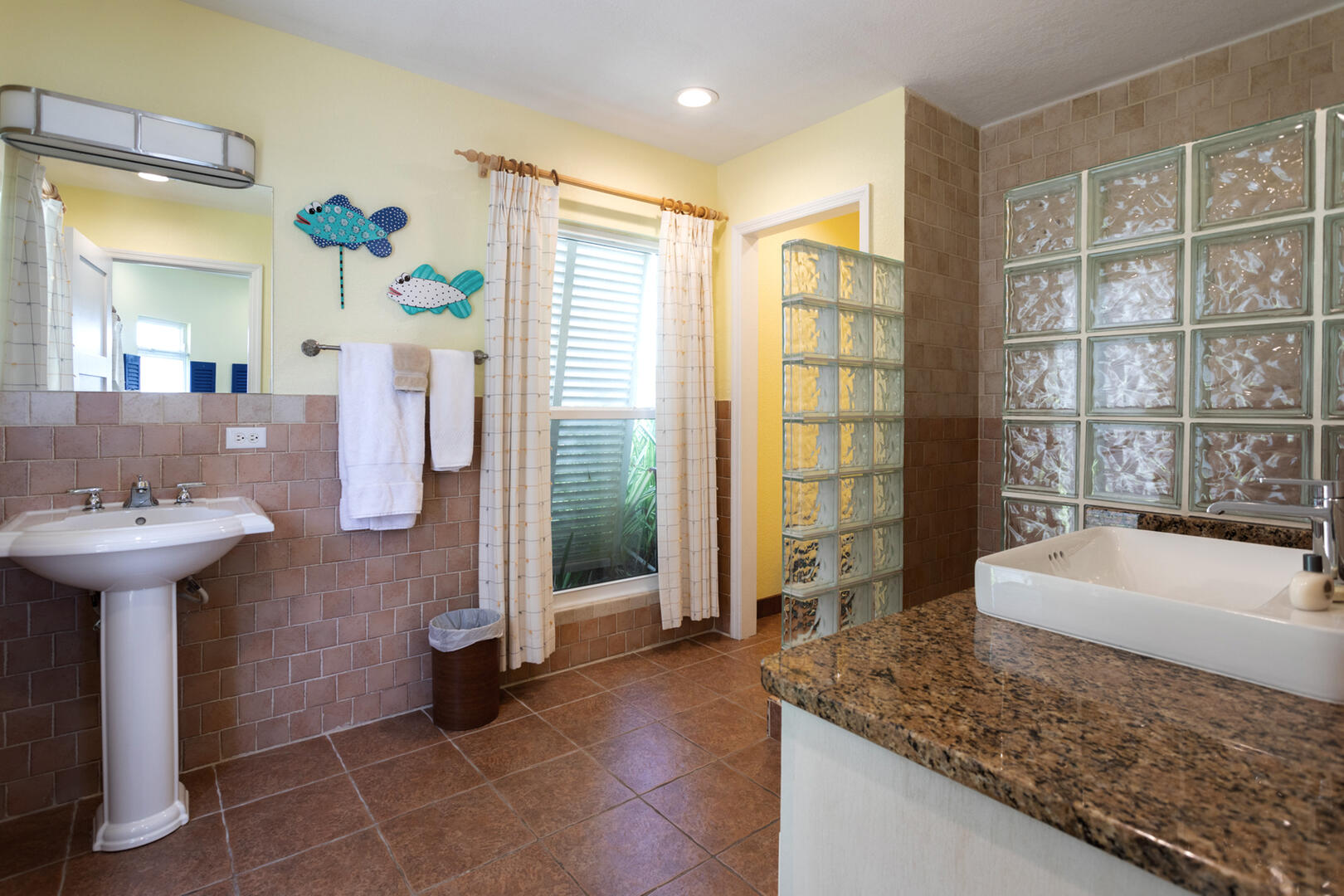Ensuite bath with walk in shower off the queen guest suite. 