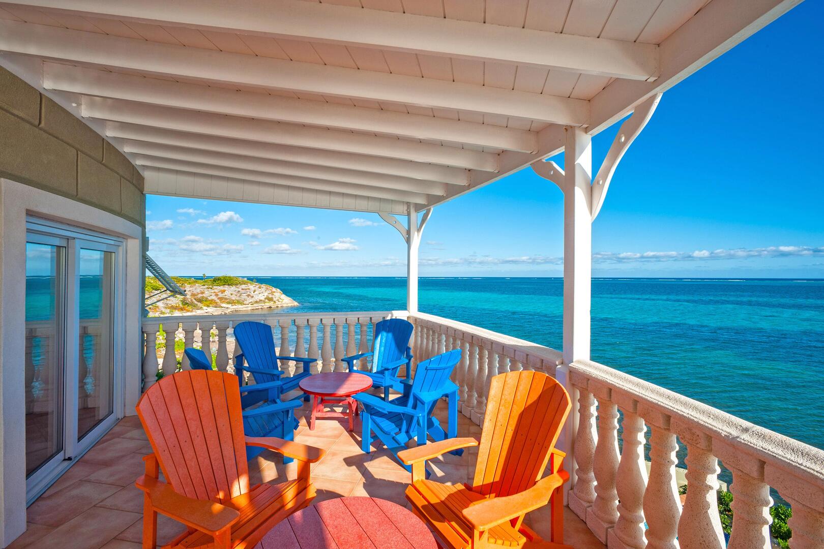 Enjoy the morning breeze on the covered deck with these beautiful blue views.