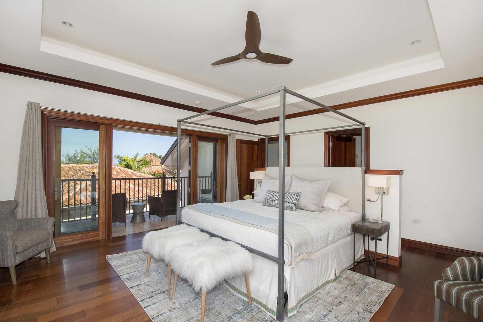 Master suite comes furnished with a king bed. 