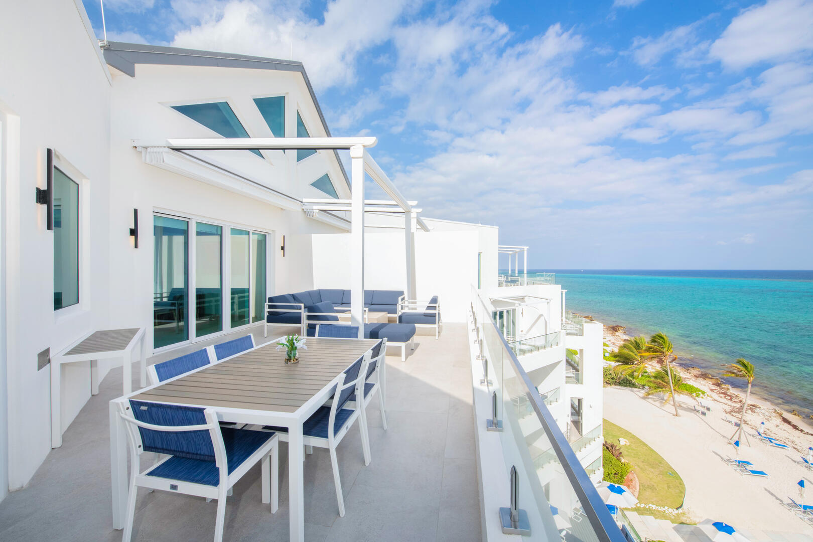 Primary Suite access to open-air balcony.