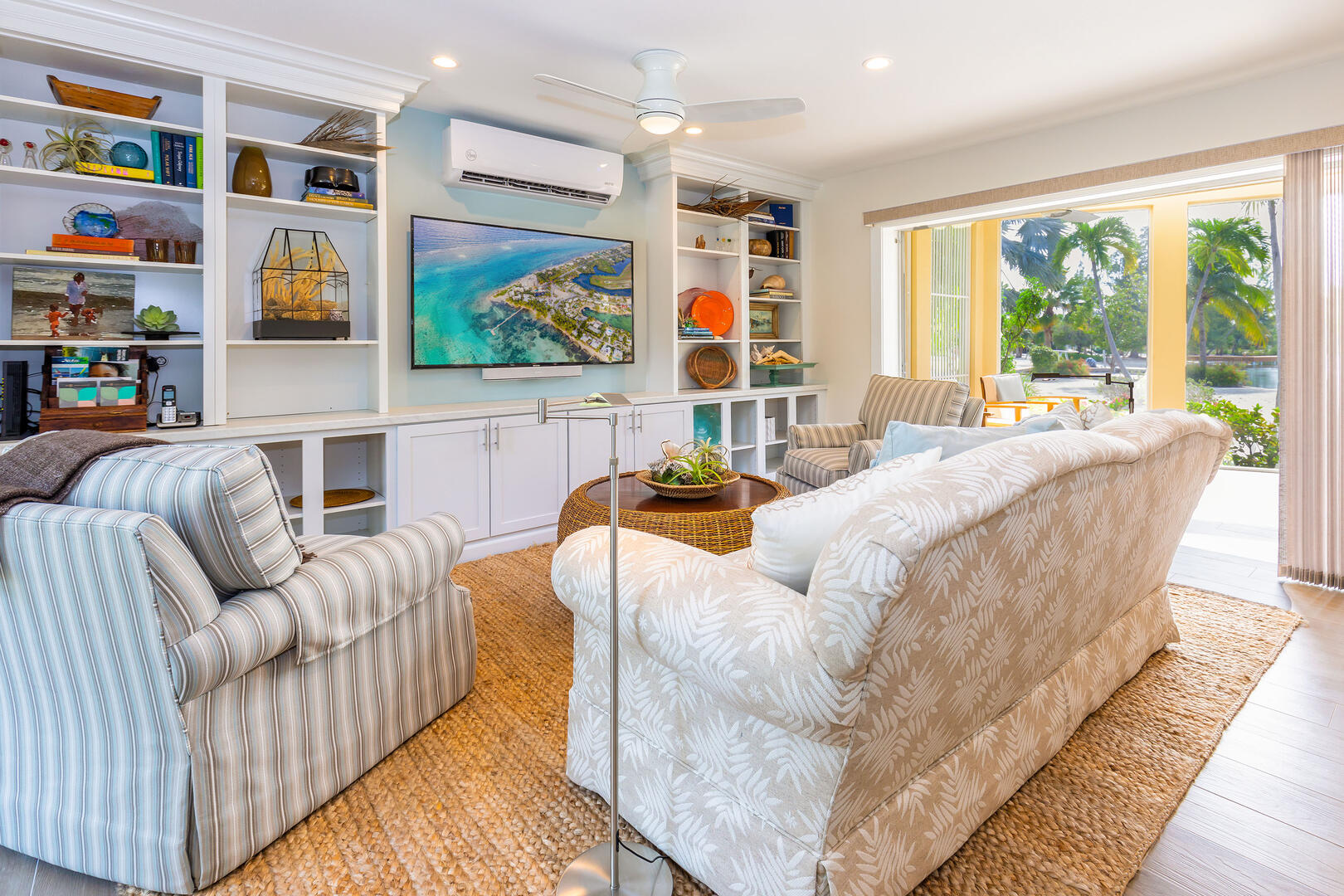 Comfy living area with walkout access to the screened patio.