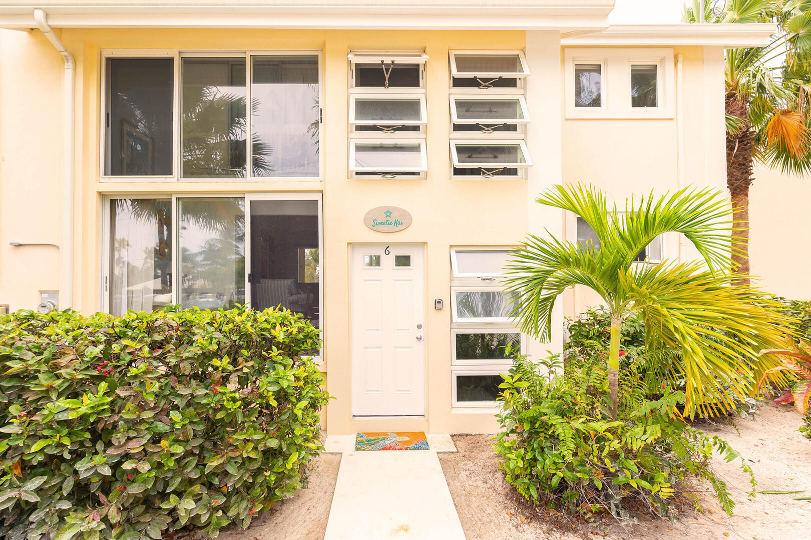 Front entrance with signage above the door. 