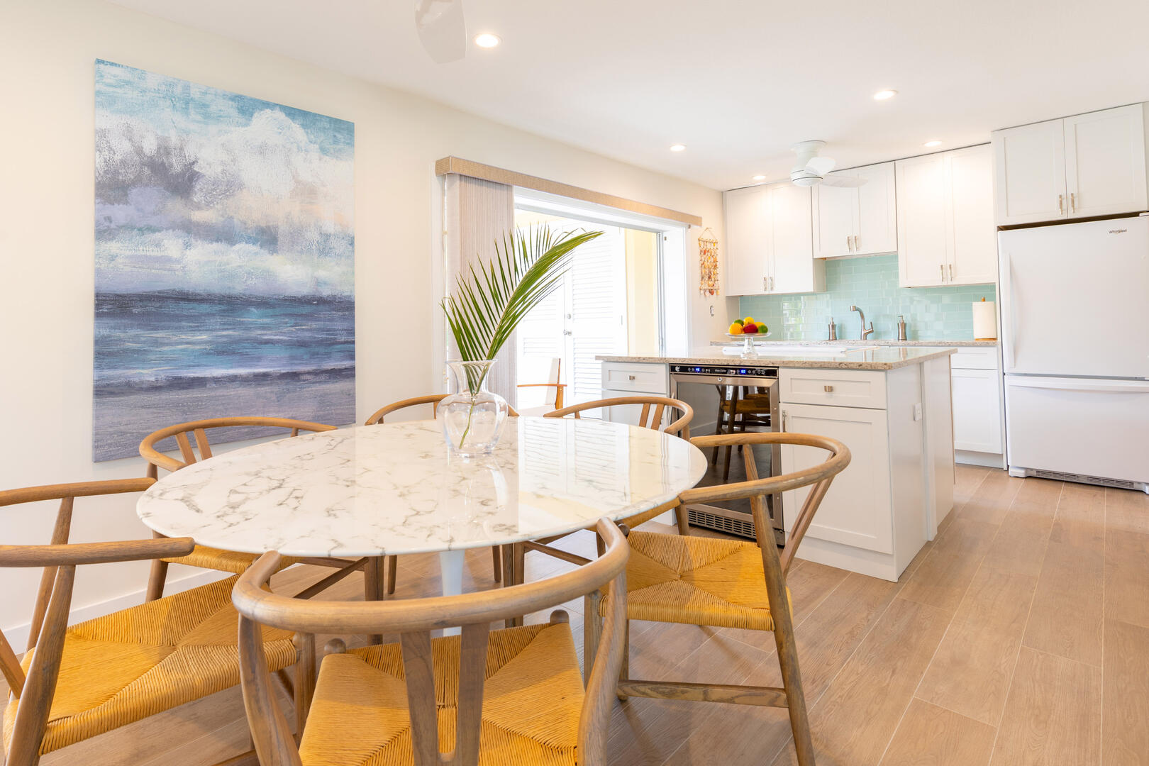 Formal dining area with seating for six. 