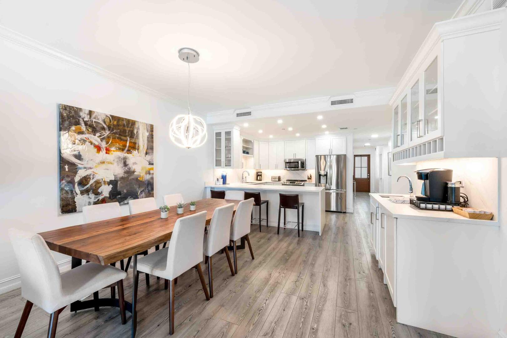 Formal dining area with seating for 8 guests. 
