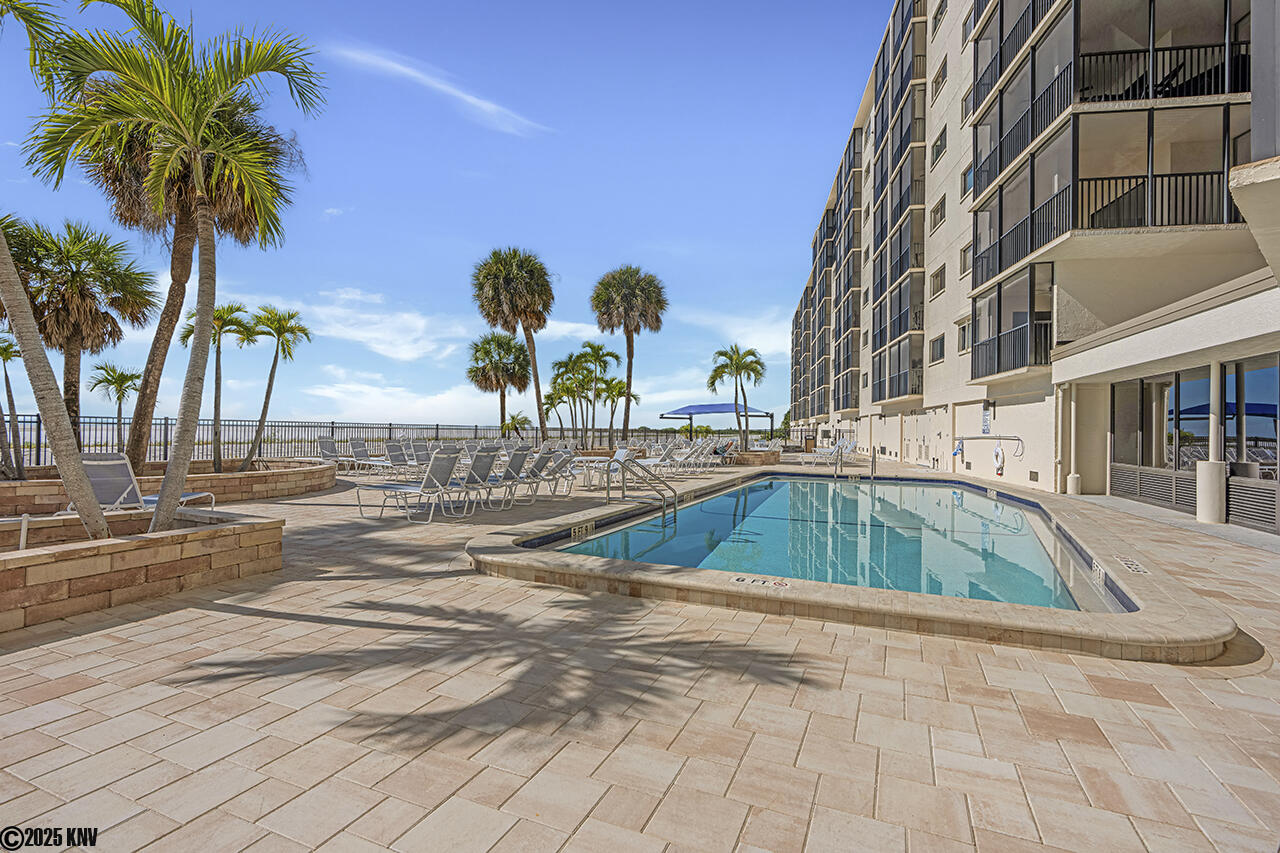 Carlos Pointe Pool and Sundeck with a generous amount of lounge chairs for guests