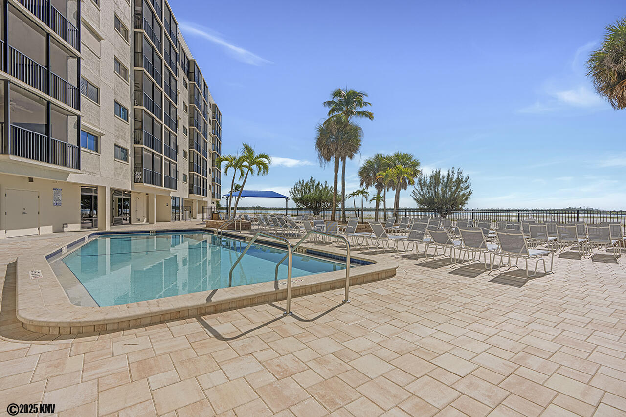 Carlos Pointe Pool and Sundeck with a generous amount of lounge chairs for guests