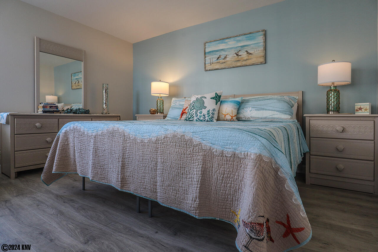 Comfy King Sized Bed outfitted with designer linens