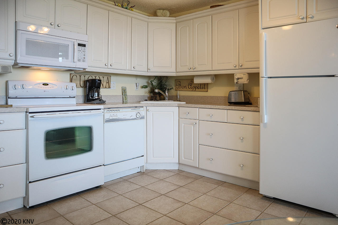 Kitchen includes all appliances, including a dishwasher