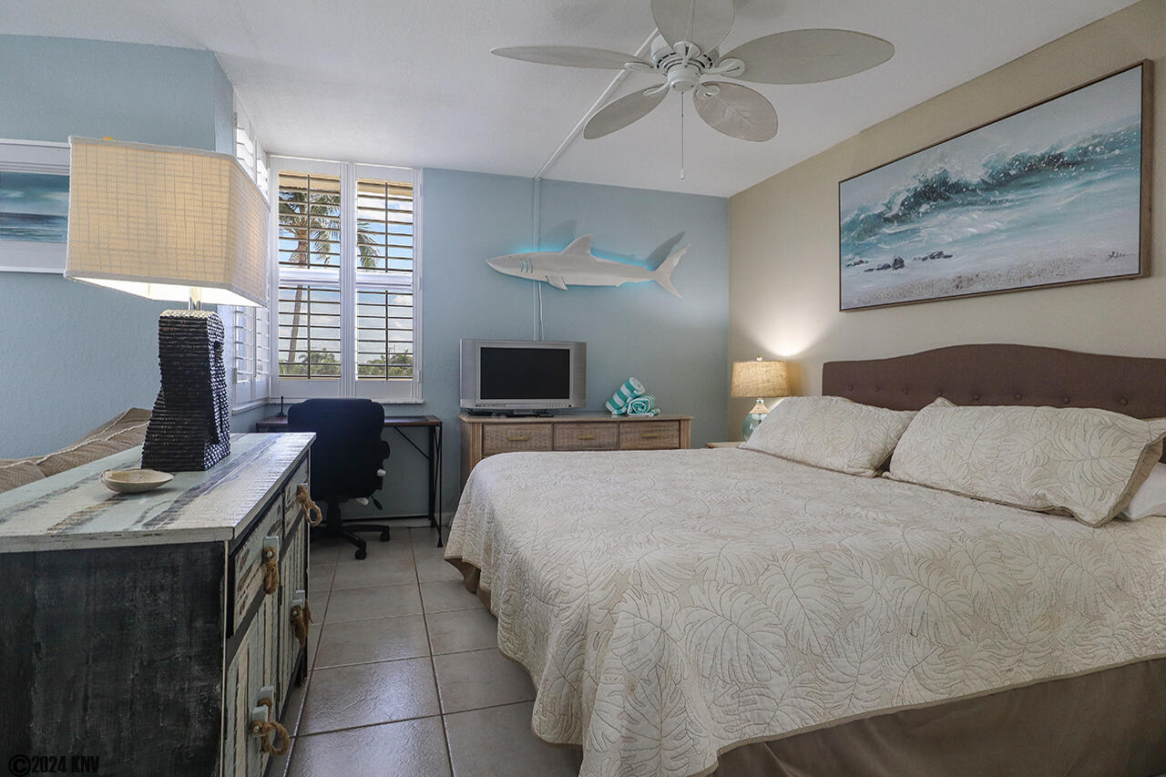 The Bedroom features a desk and chair for working remotely