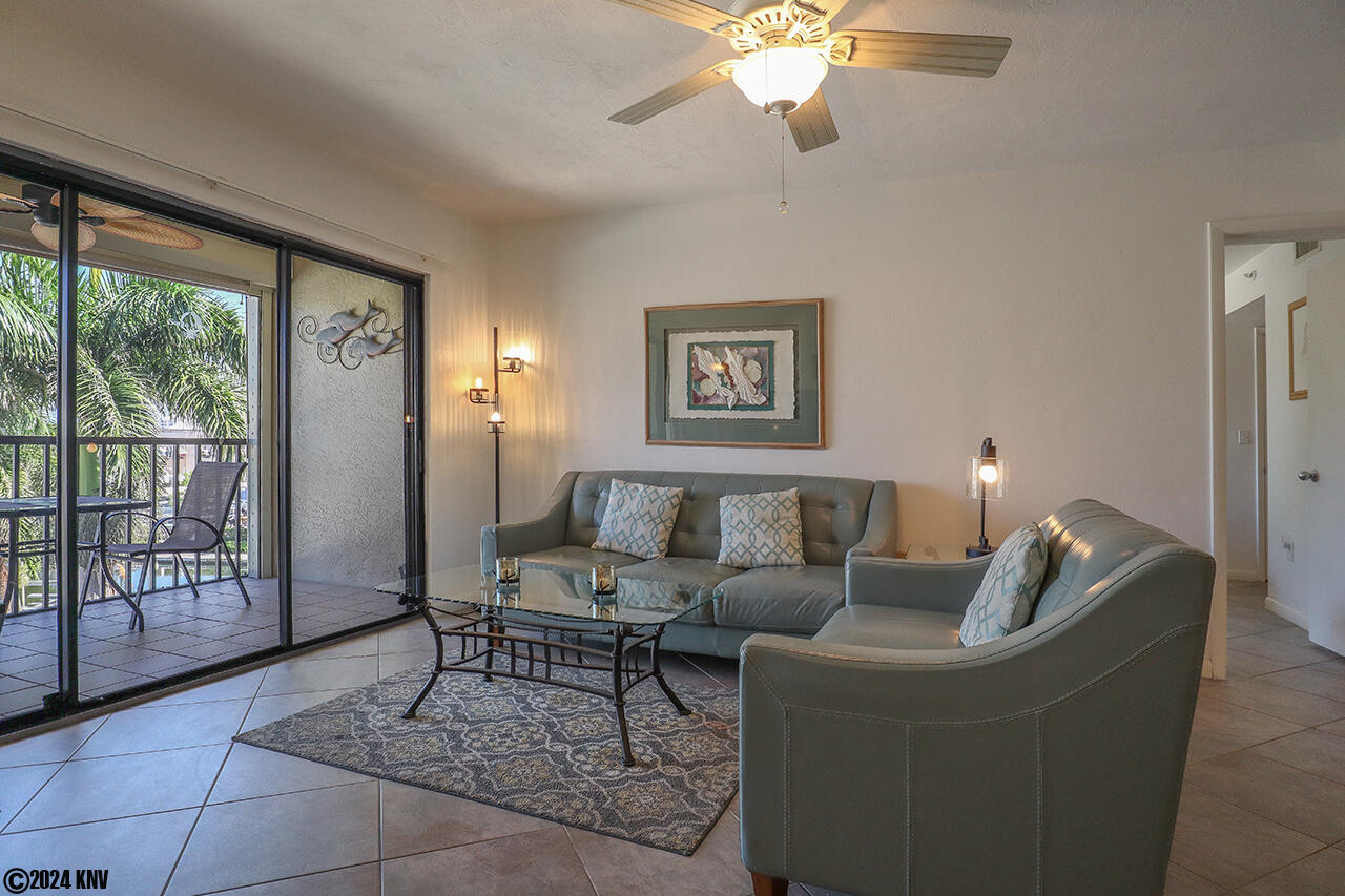 Open floor living spaces lead to Screened In Lanai