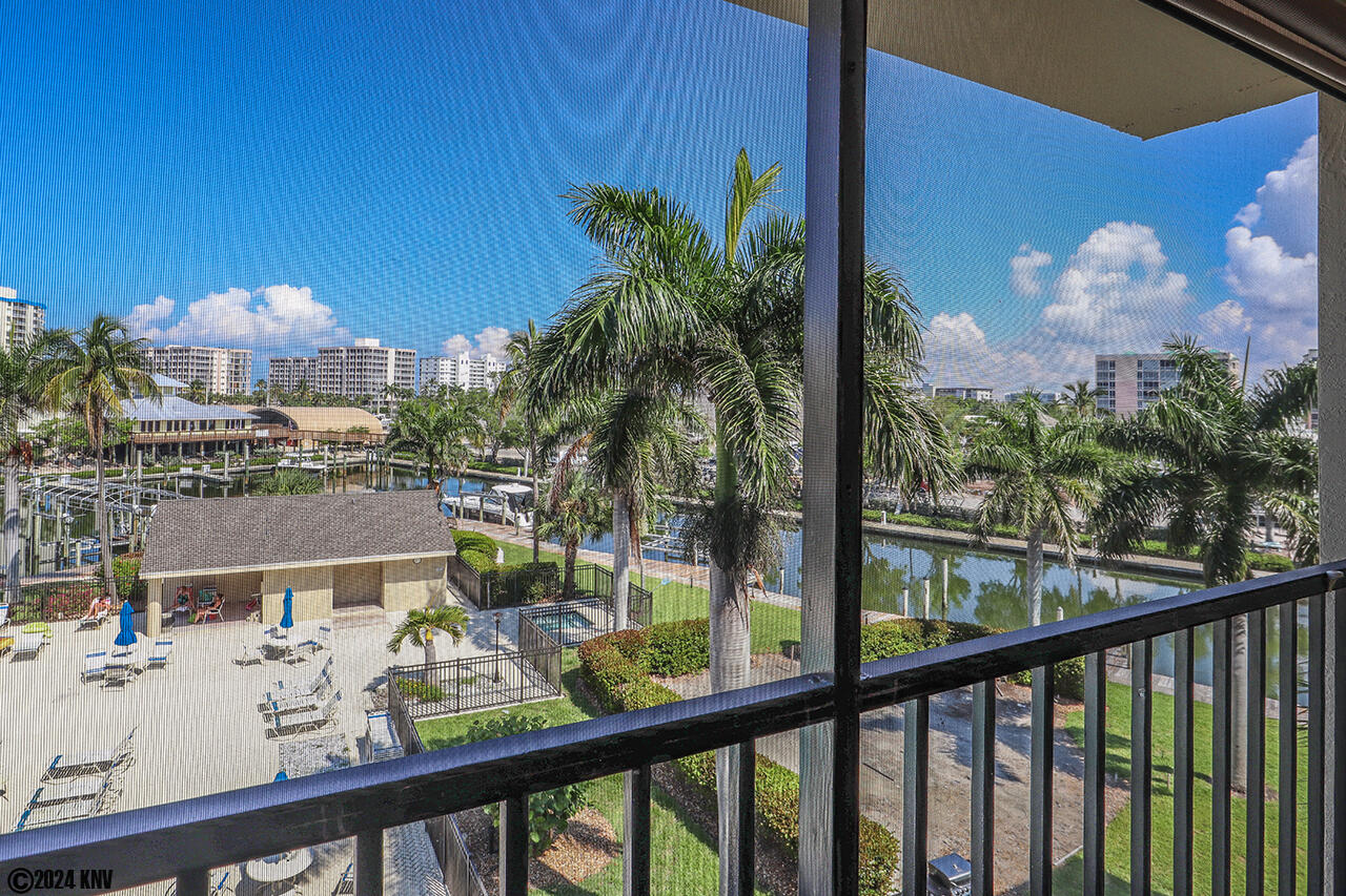 Lanai View of the Pool and the Canal Waters around Santa Maria Harbour Resort