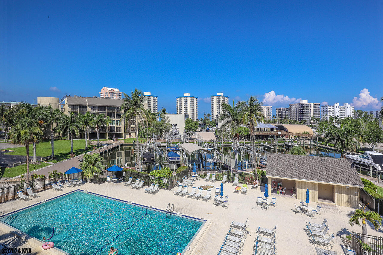 Lanai View of the Pool and the Canal Waters around Santa Maria Harbour Resort