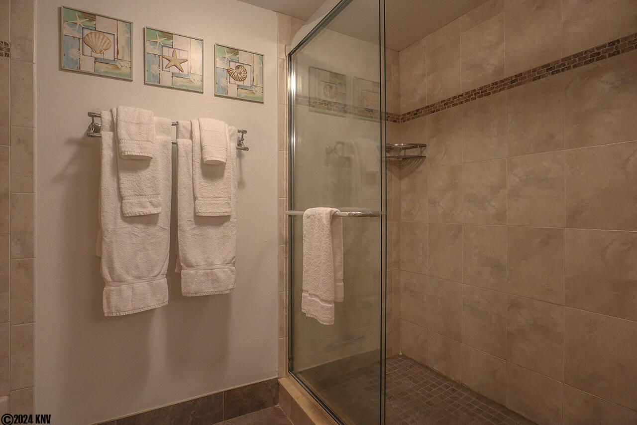 Master Bath features a large, custom tiled Walk In Shower