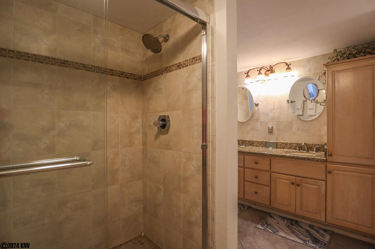 Master Bath features a large custom tiled Walk In Shower