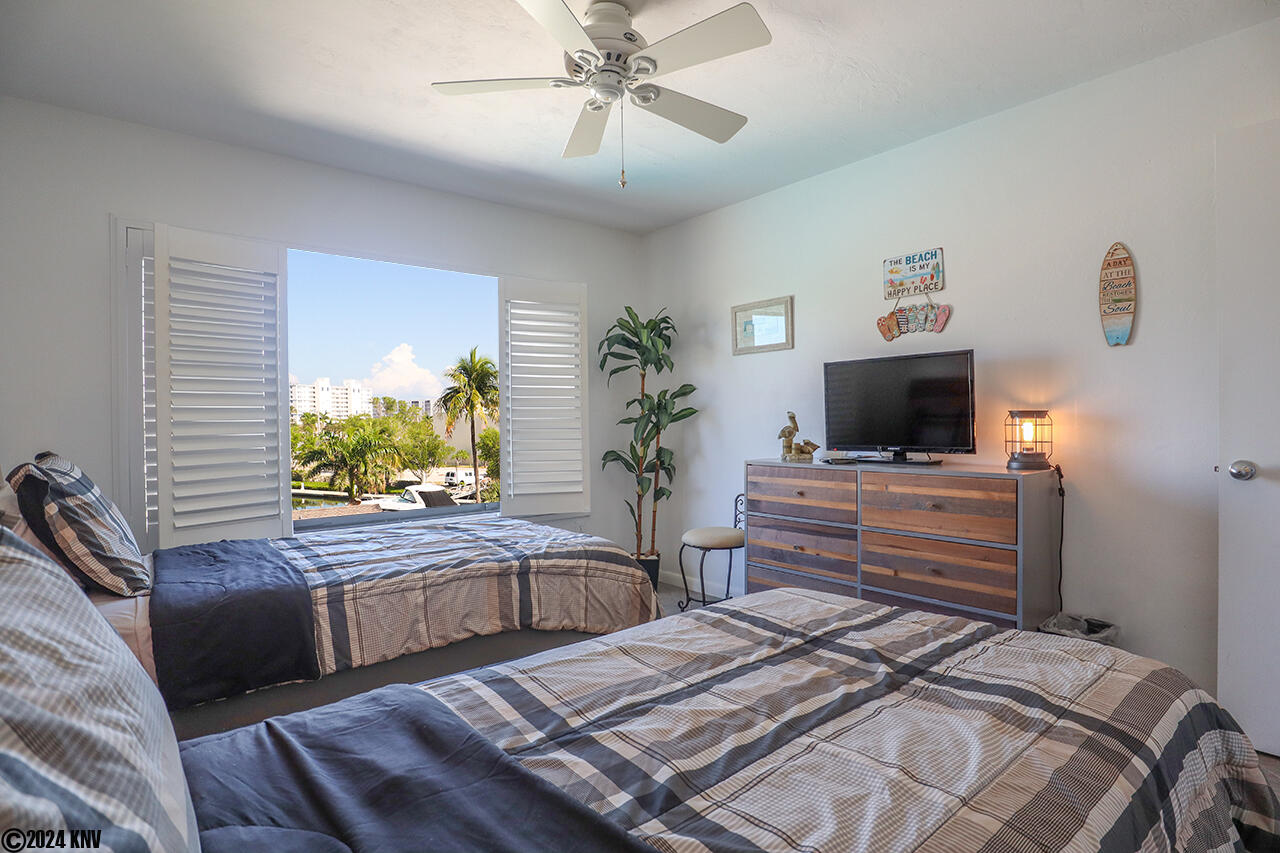 Two Twin Beds and TV in the Guest Bedroom