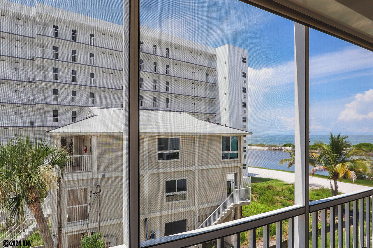 Partial view of the turquoise waters of the Gulf from your Lanai