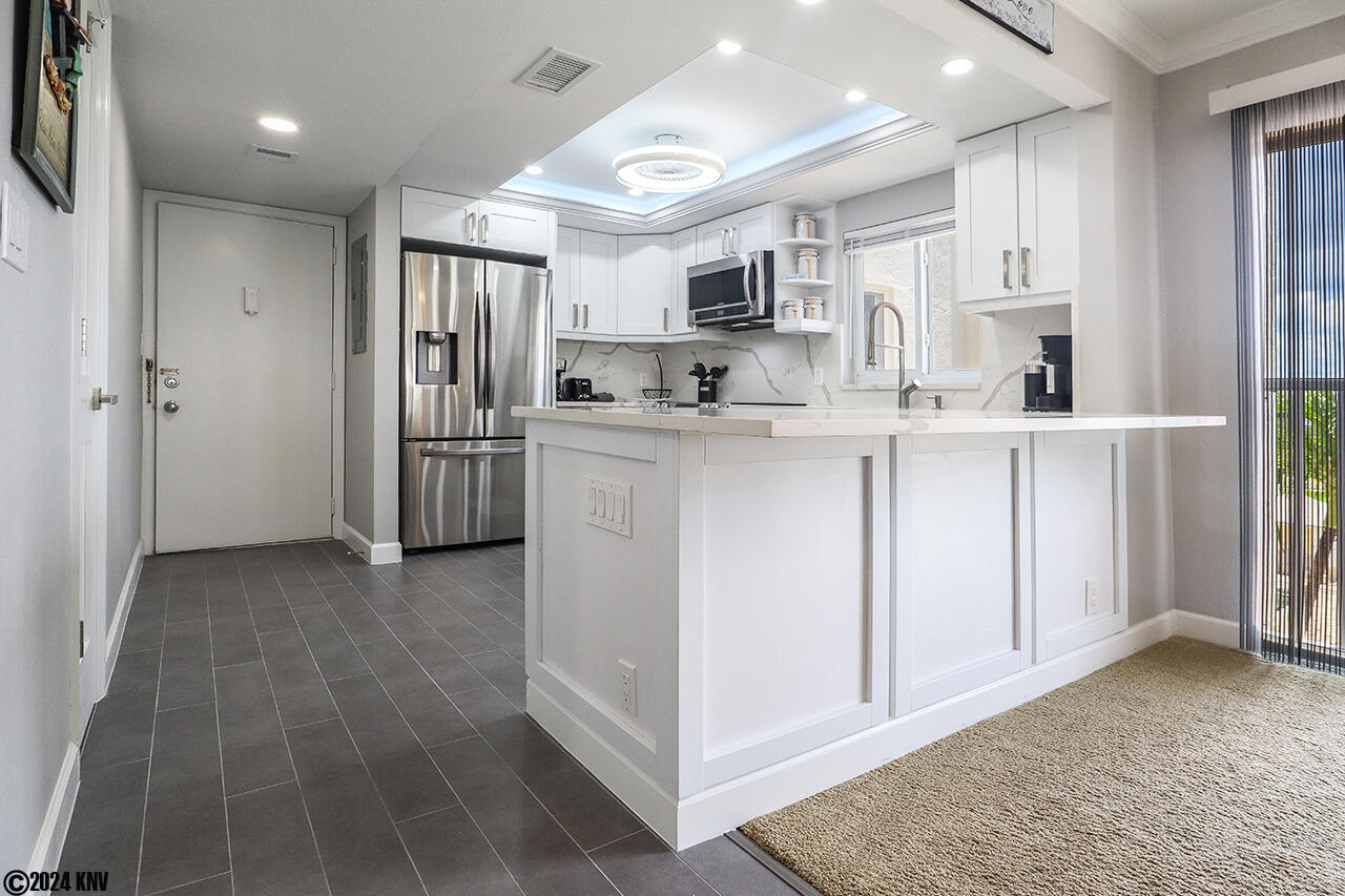 Newly Remodeled Kitchen features designer lighting