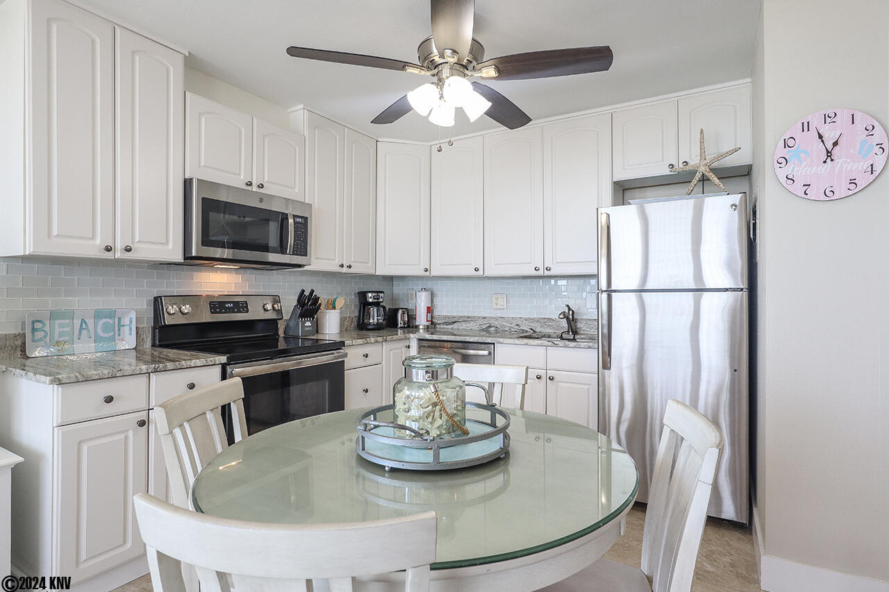 Your all white, stainless steal Kitchen