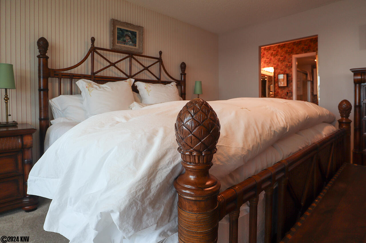 King Sized Bed fitted with Designer Linens awaits you after a full day on the island