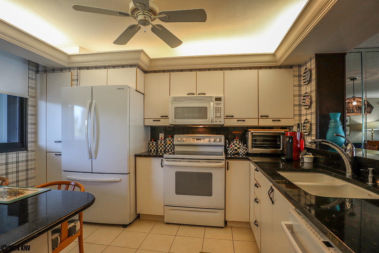 Beautifully Designed Kitchen has all new appliances with marble countertops