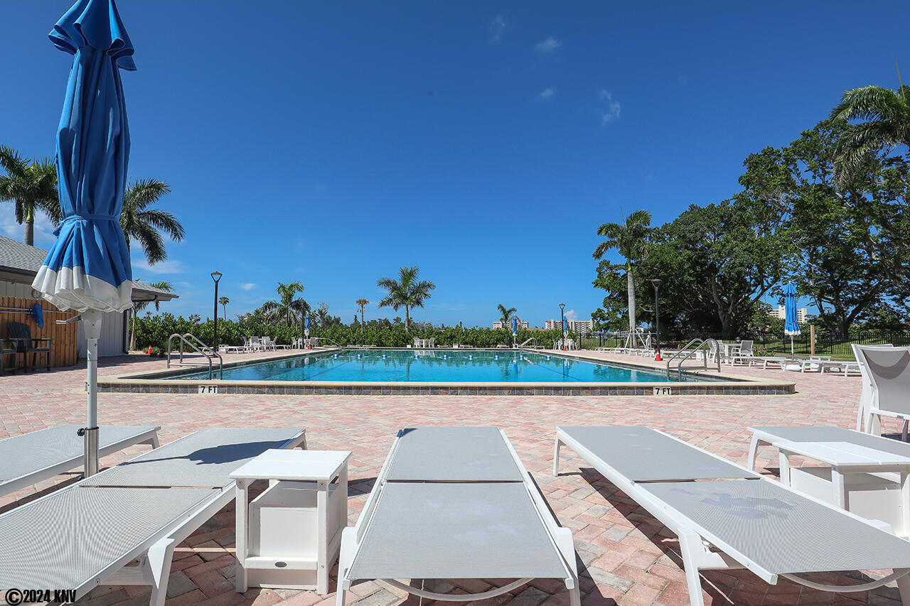 Fabulous New Resort Sized Heated Pool with Sundeck with Lounge Chairs and Picnic Tables