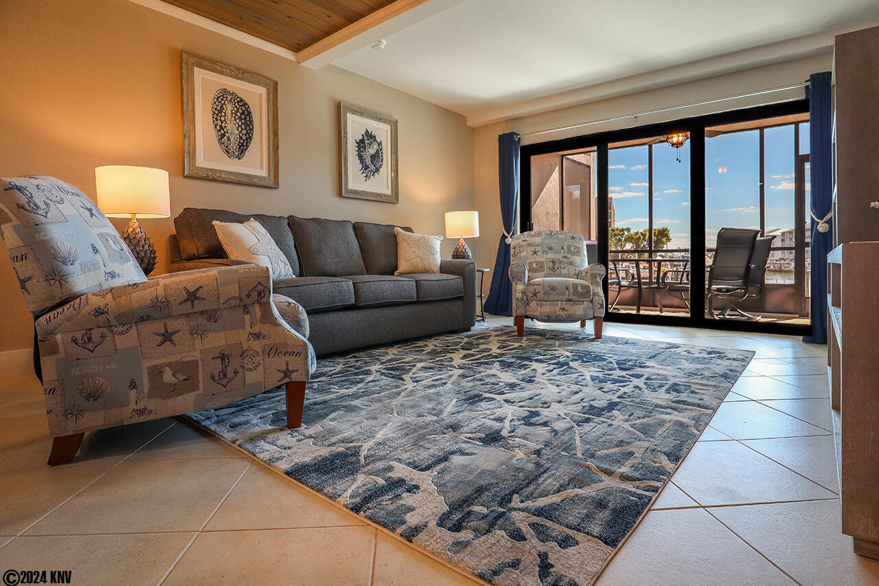 Beautifully Remodeled, Professionally Decorated and FABULOUS...the Waterfront Estero Yacht and Racquet Club 215