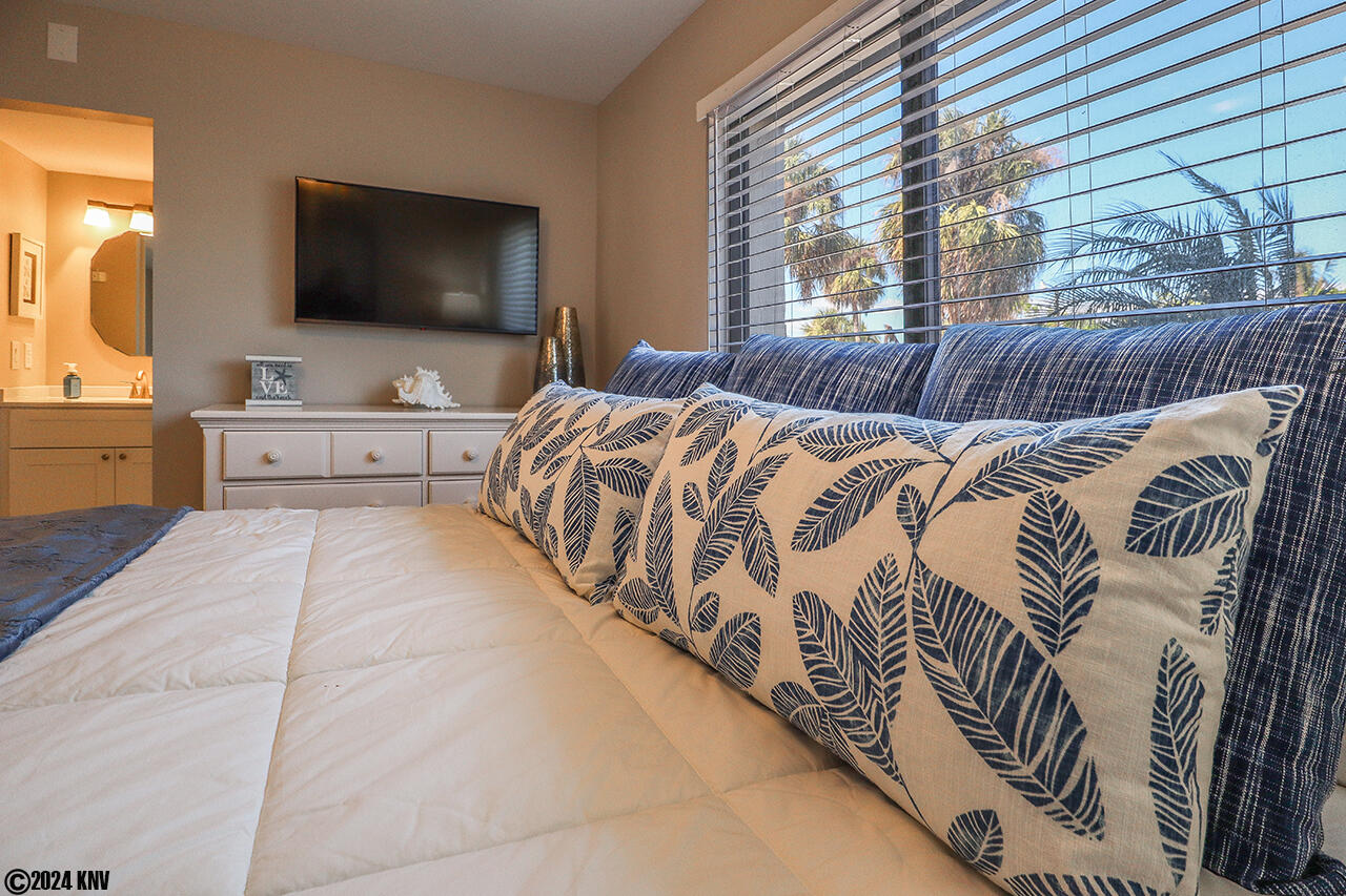 Dressed in Designer Linens, the King Sized Bed offers comfort to its lucky guests!