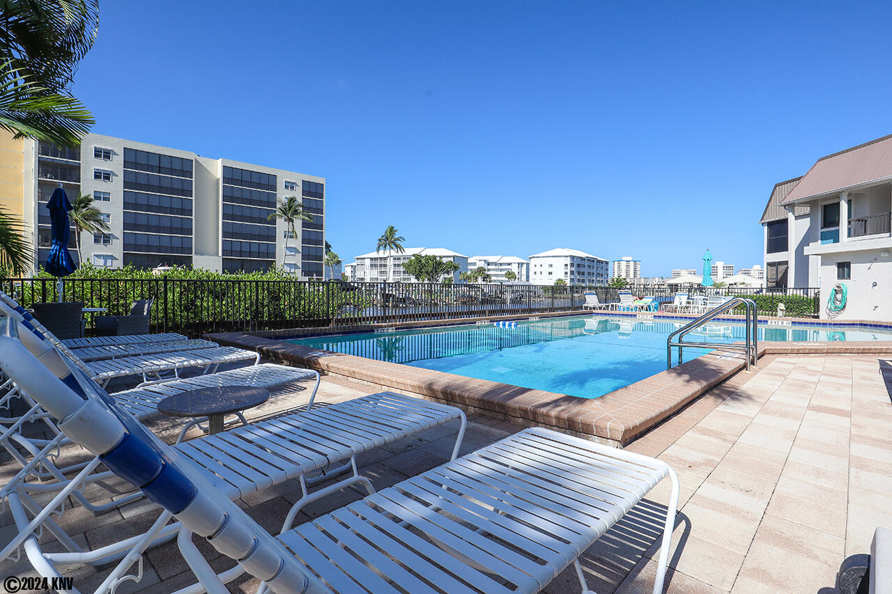 Estero Yacht And Racquet Club has a Resort Sized Pool and Sundeck